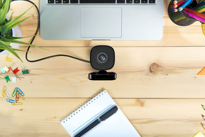 High angle view of camera on table