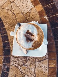 High angle view of coffee cup on table