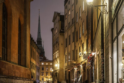 Buildings in city at night