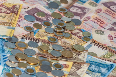 High angle view of coins on table