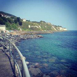 Scenic view of sea against blue sky