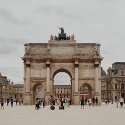 Group of people in front of historical building