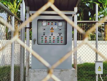 Information sign on chainlink fence