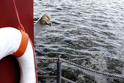 Close-up of boat sailing in sea