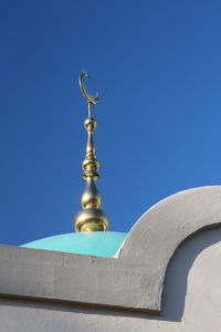 Low angle view of building against blue sky