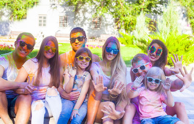 Portrait of people with colored faces during holi