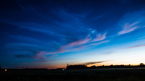 Scenic view of dramatic sky over landscape