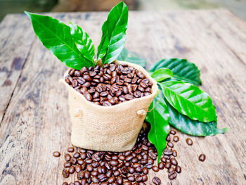 Close-up of coffee beans on table