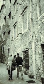 Woman standing in front of building