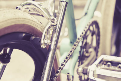 Close-up of bicycle wheel on road