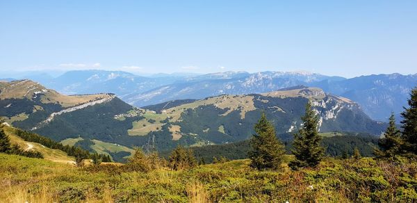 Scenic view of landscape and mountains against sky