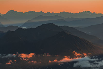 Scenic view of mountains against sky during sunset