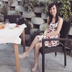 Portrait of woman sitting on chair