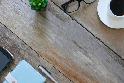 High angle view of coffee cup on table