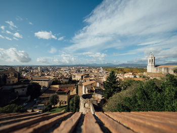 High angle view of trees and buildings against sky