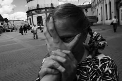 Portrait of man on street in city