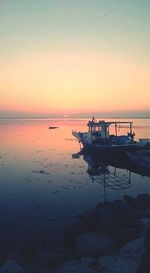 Scenic view of sea at sunset