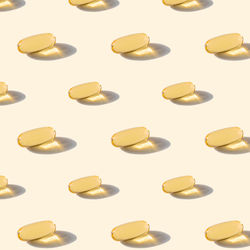 Close-up of pills on white background