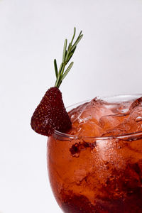 Close-up of strawberry against white background