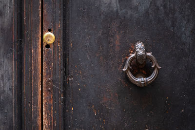 Close-up of rusty metal door