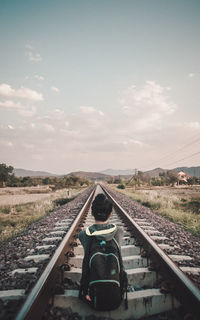 Train on railroad track against sky