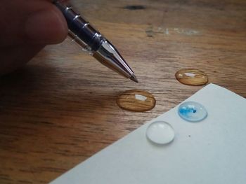 Close-up of man on table