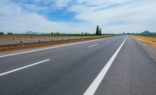 Surface level of road against sky