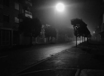 Illuminated street light at night