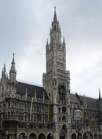 Low angle view of buildings in city against sky