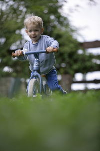 Low angle view of boy playing in park