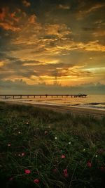 Scenic view of sea against sky during sunset