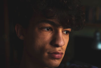 Close-up portrait of a serious young man