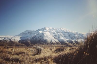 Scenic view of snowcapped mountains against sky