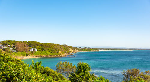 Scenic view of sea against clear sky