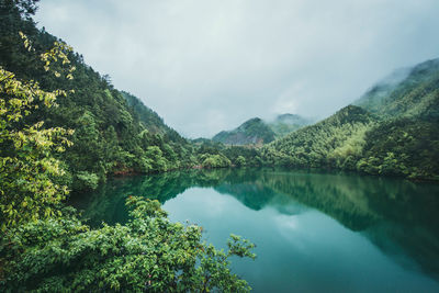 Lake in misty mountains