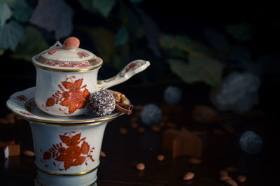 Close-up of tea cup on table