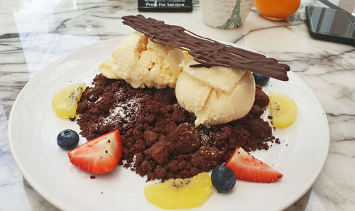 Close-up of dessert served on table