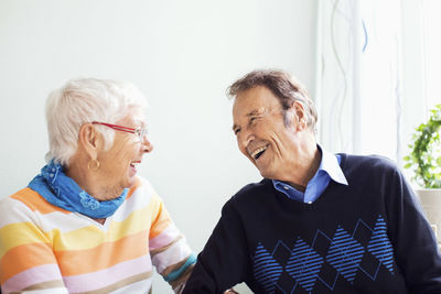 Happy senior couple spending leisure time at nursing home