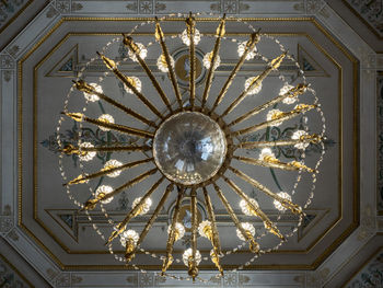 Low angle view of illuminated chandelier