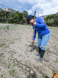 Women tilling the land nature in growth, agricultura fertile ground