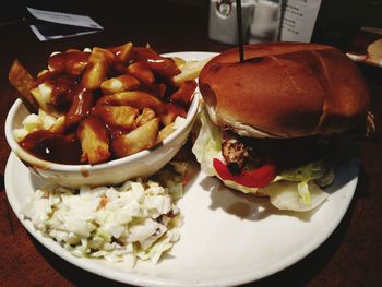 Close-up of burger in plate on table