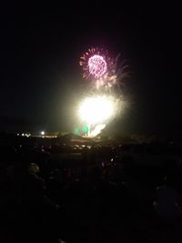 Firework display at night