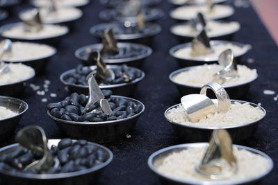 High angle view of rings on food in bowls at table