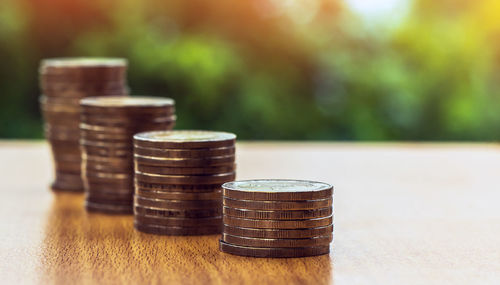 Stack of coins on table