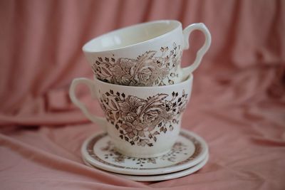 Close-up of cup on table