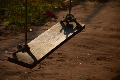 Close-up of swing in playground