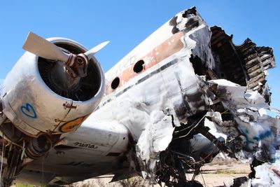 Close-up of abandoned airplane