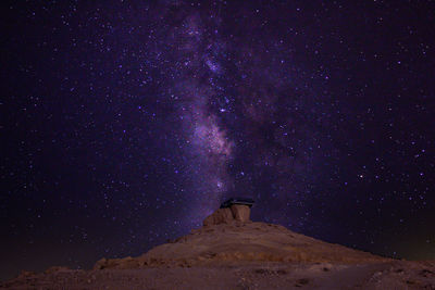 Low angle view of stars against sky at night