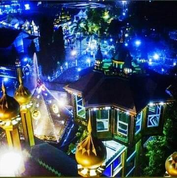 night, illuminated, architecture, no people, arts culture and entertainment, building exterior, built structure, amusement park, city, amusement park ride, travel destinations, lighting equipment, high angle view, nature, outdoors, building, light - natural phenomenon, city life, nightlife, celebration, luxury