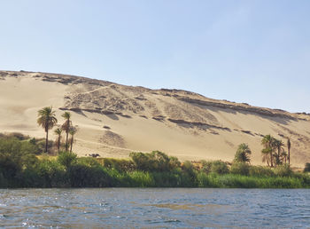 Scenic view of desert against clear sky